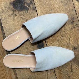 LOU.EARL flat leather suede mules.
